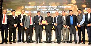 The then Hon’ble Minister for Petroleum & Natural Gas and Steel, Shri Dharmendra Pradhan, presenting the FIPI Company of the Year Award for Excellence in Human Resource Management to C&MD, Shri M. K. Surana and Director - HR, Shri Pushp Kumar Joshi